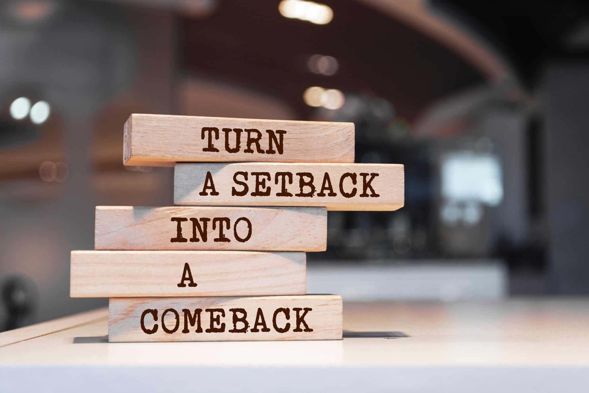 stacked blocks that read "turn a setback into a comeback"